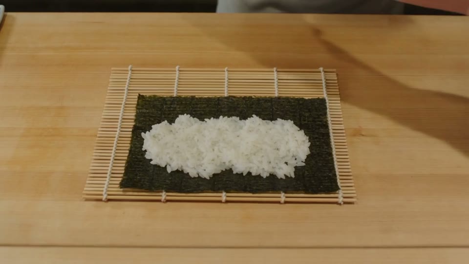 Seedance 2.0: A sushi chef working in close and overhead views.